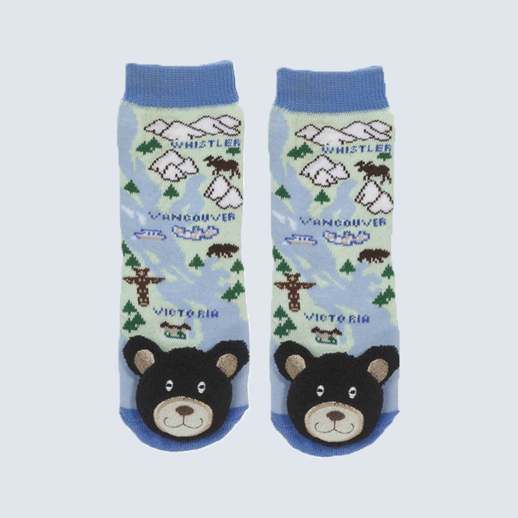 Two socks against a white background. Each sock features a map of British Columbia, and a black bear plush on the toe.
