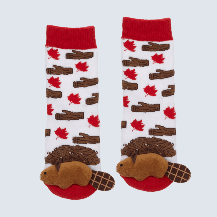 Two red and white socks against a white background. The socks feature a maple leaf and wood motifs. Each toe features a cute plush beaver.