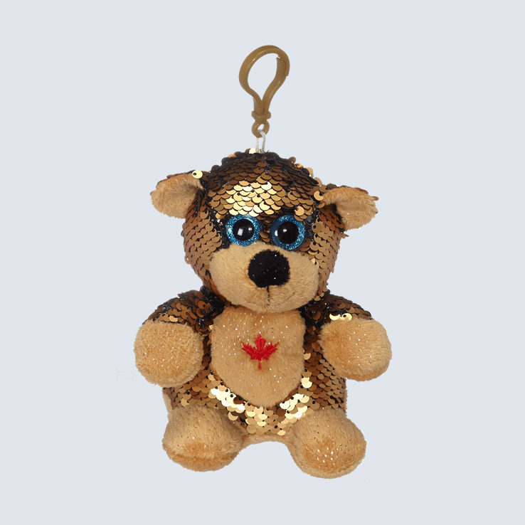 A sequin bear keychain against a white background.