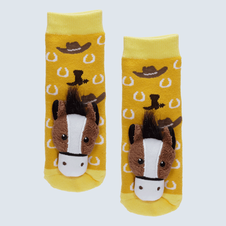 Two yellow and gold socks against a white background. The socks feature a horse plush on each toe and a horseshoe and cowboy hat motif.